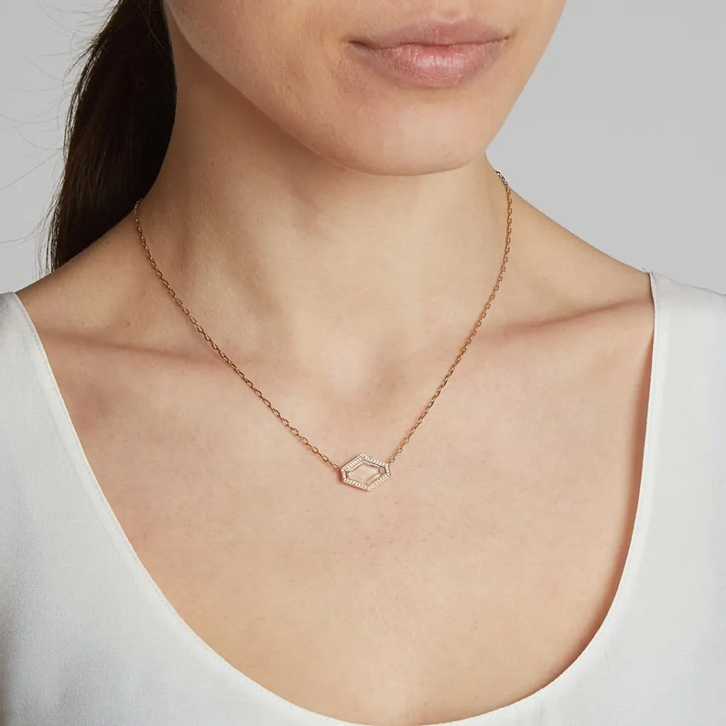BELL 18K AND DIAMOND ELONGATED HEXAGONAL ROCK CRYSTAL PENDANT