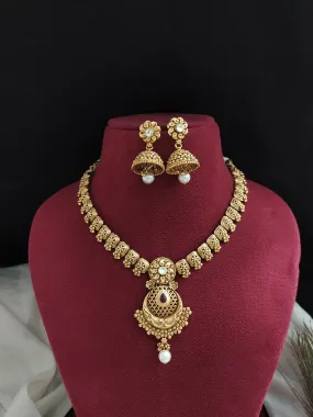 "Antique Plain Gold Replica Necklace with Jhumki - Ruby and White Stone Accents"